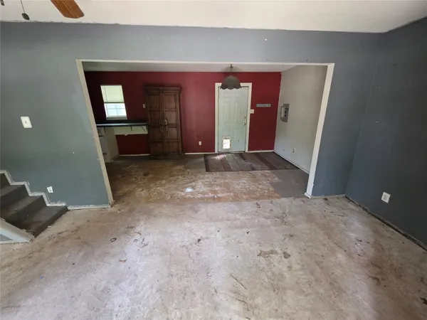 a view of livingroom and hardwood floor