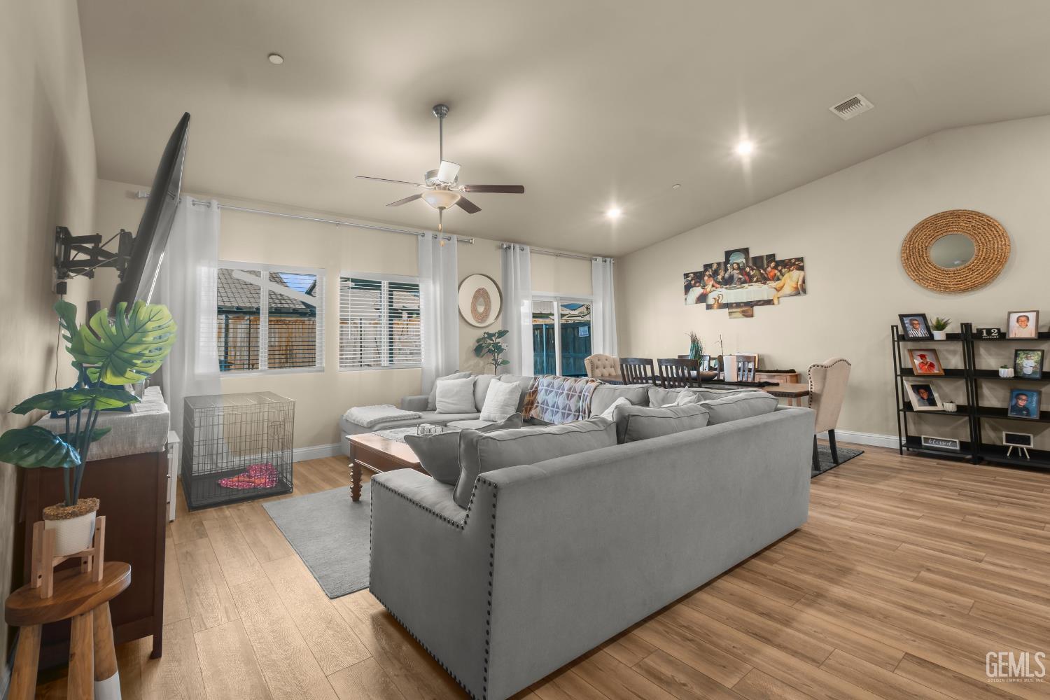 Undisclosed Address Shafter, CA 93263 - Photo 13 of 38 a living room with furniture and a wooden floor