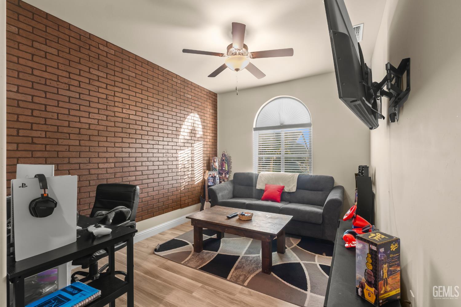Undisclosed Address Shafter, CA 93263 - Photo 25 of 38 a living room with furniture and a window