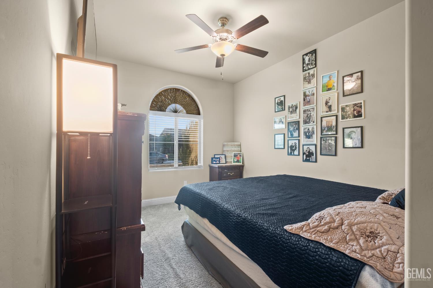 Undisclosed Address Shafter, CA 93263 - Photo 27 of 38 a bedroom with a bed and a window