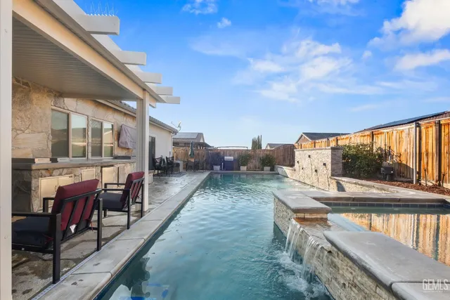 a view of a balcony with furniture