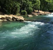 a view of a street with side of a house
