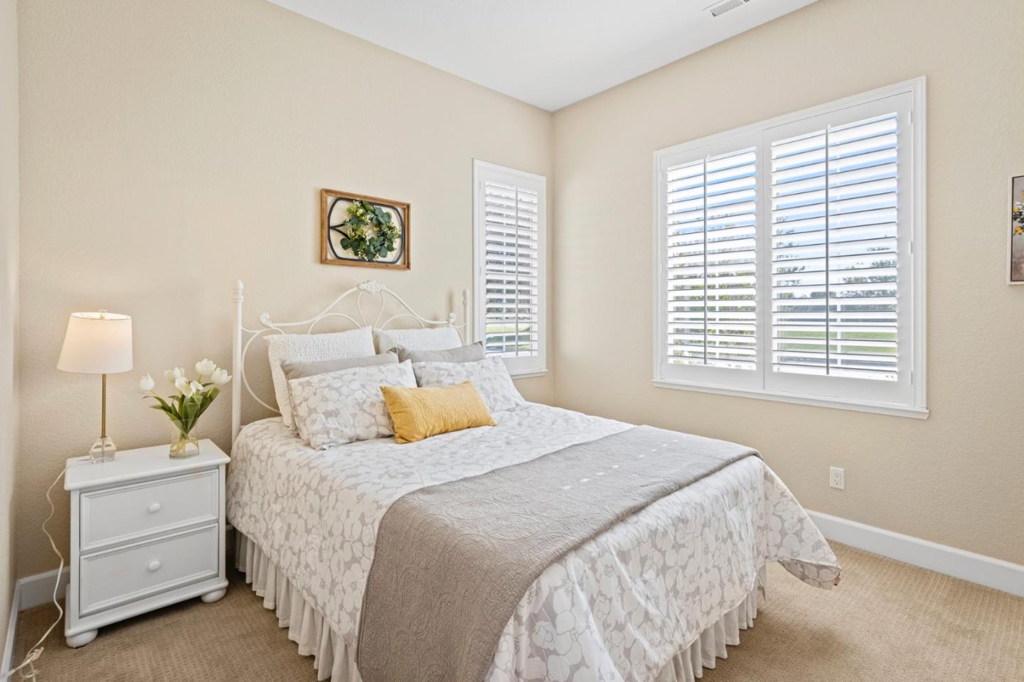 1937 St Andrews Circle Gilroy, CA 95020 - Photo 11 of 64 a bedroom with a bed and a window