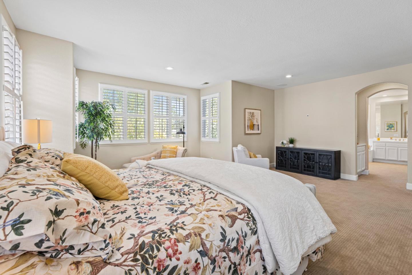 1937 St Andrews Circle Gilroy, CA 95020 - Photo 34 of 64 a bedroom with a large bed and a dresser