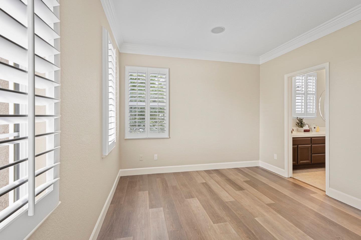 1937 St Andrews Circle Gilroy, CA 95020 - Photo 43 of 64 a view of empty room with wooden floor and fan