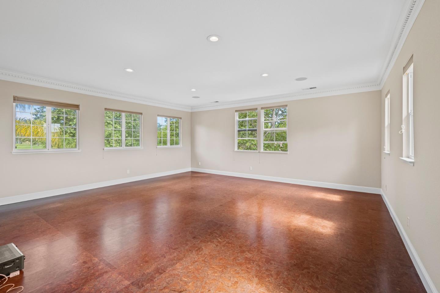 1937 St Andrews Circle Gilroy, CA 95020 - Photo 51 of 64 a view of an empty room with wooden floor and a window