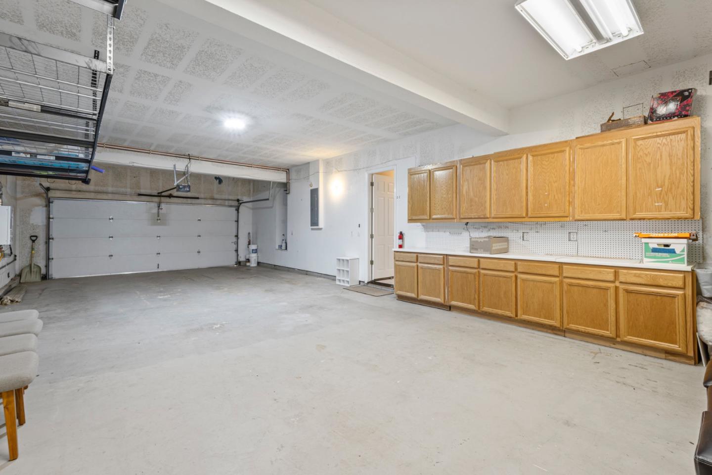 1937 St Andrews Circle Gilroy, CA 95020 - Photo 55 of 64 a view of a kitchen with wooden cabinets