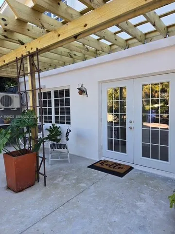 a view of a house with porch and sitting area