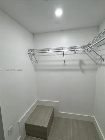 a view of a room with racks on the wall