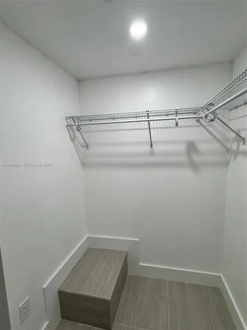 a view of a room with racks on the wall