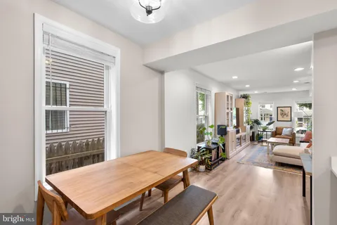 a very nice looking living room with a large window