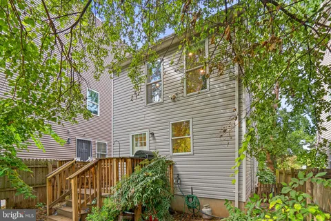 a view of a house with a tree