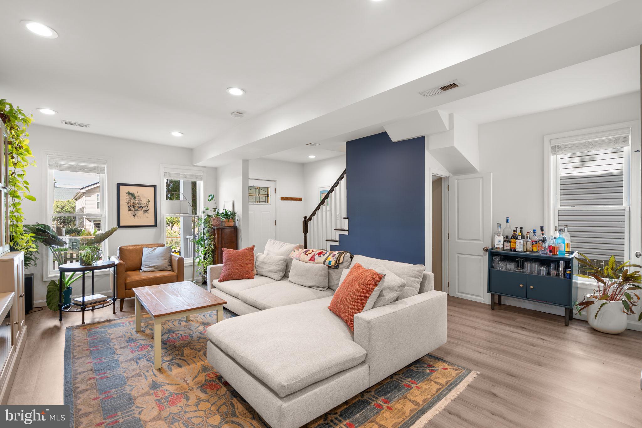1015 48th Street Northeast Washington, DC 20019 - Photo 5 of 28 a living room with furniture and wooden floor