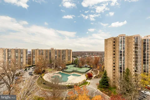 a view of a city with tall buildings