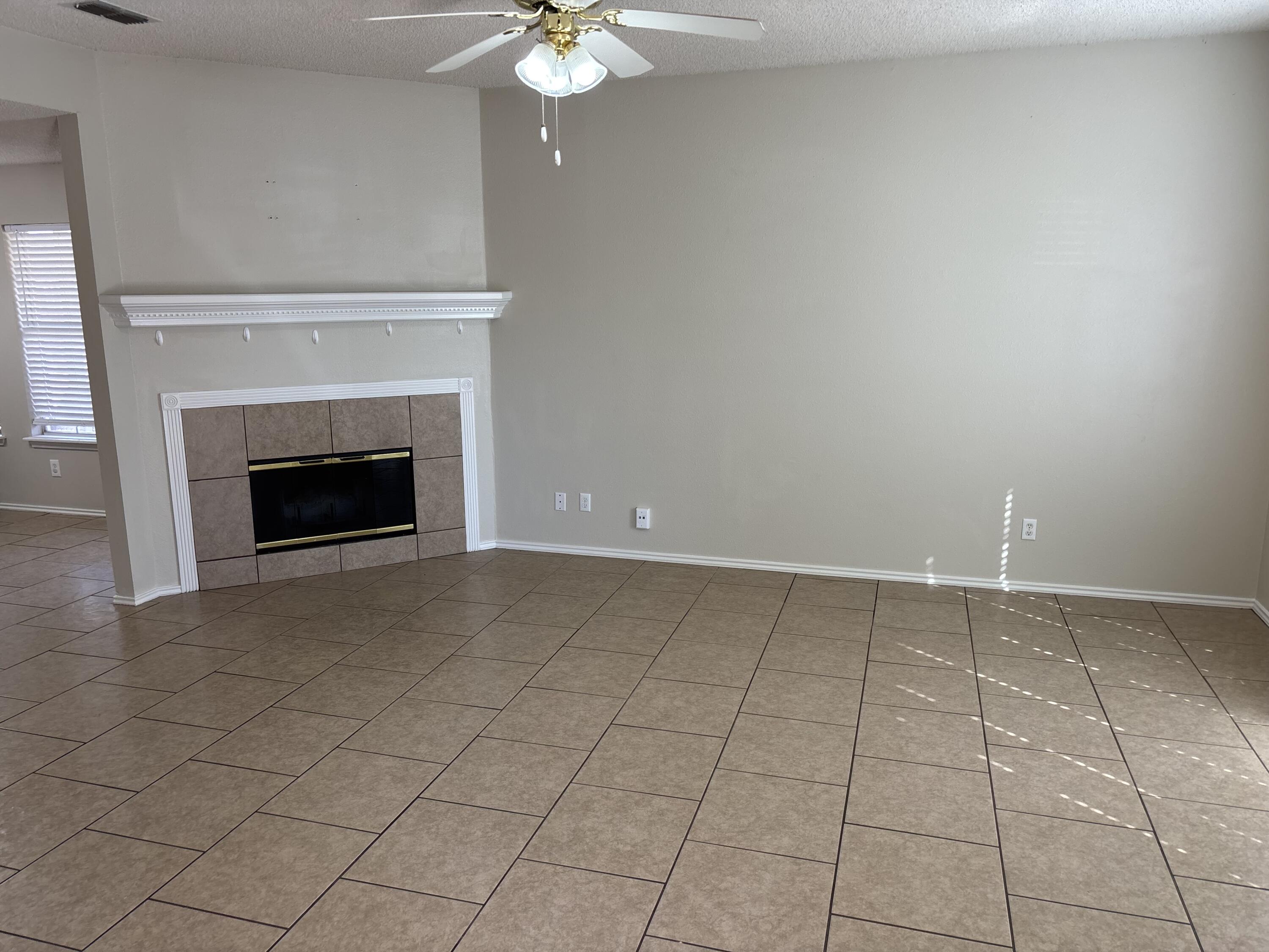 2914 88th Street Lubbock, TX 79423 - Photo 3 of 20 fireplace