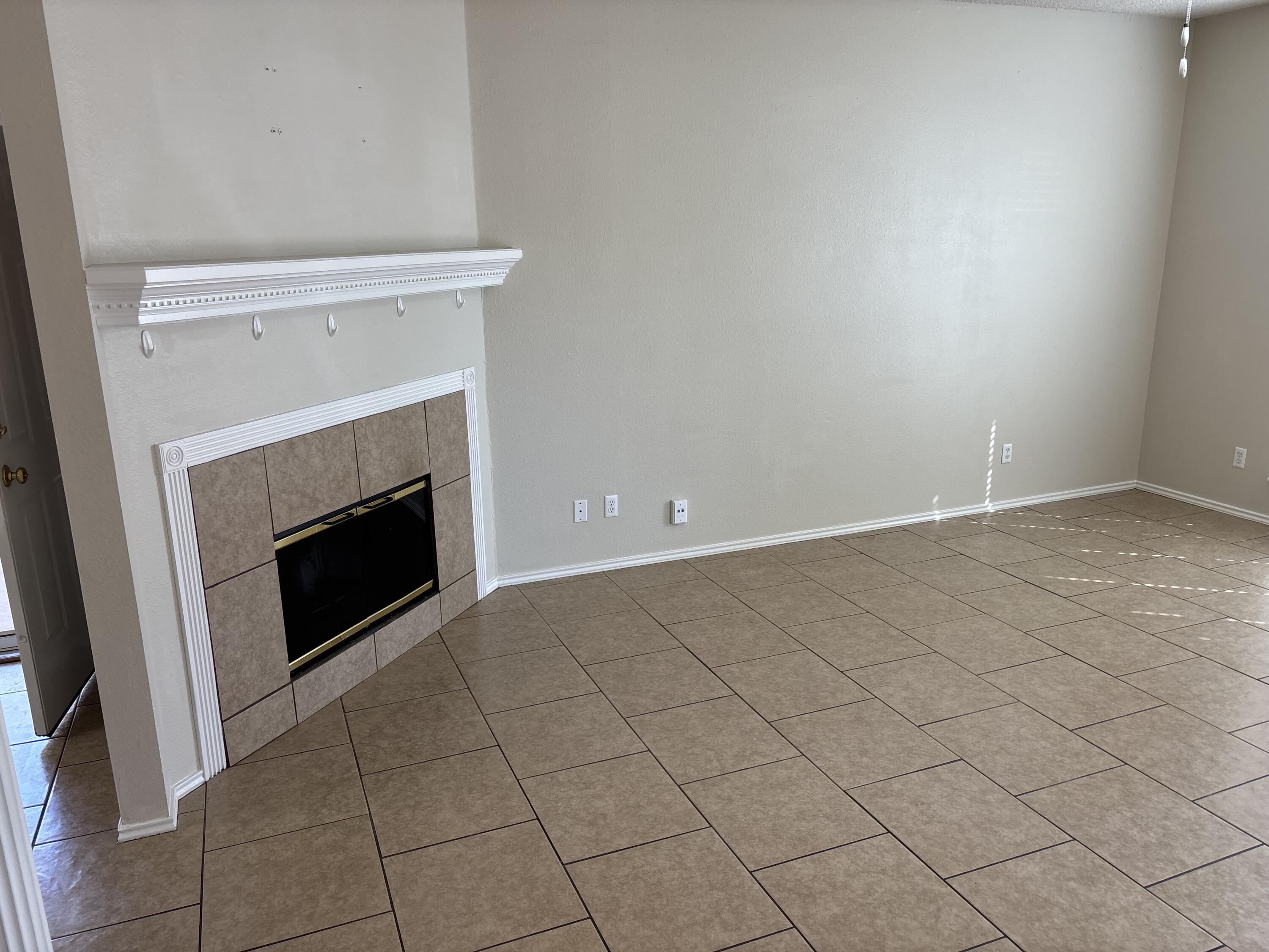 2914 88th Street Lubbock, TX 79423 - Photo 6 of 20 living room7CCF5D-F6A8-4091-B973-199