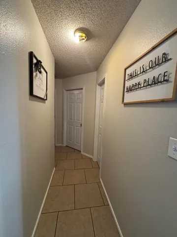 wooden floor in an empty room and a window