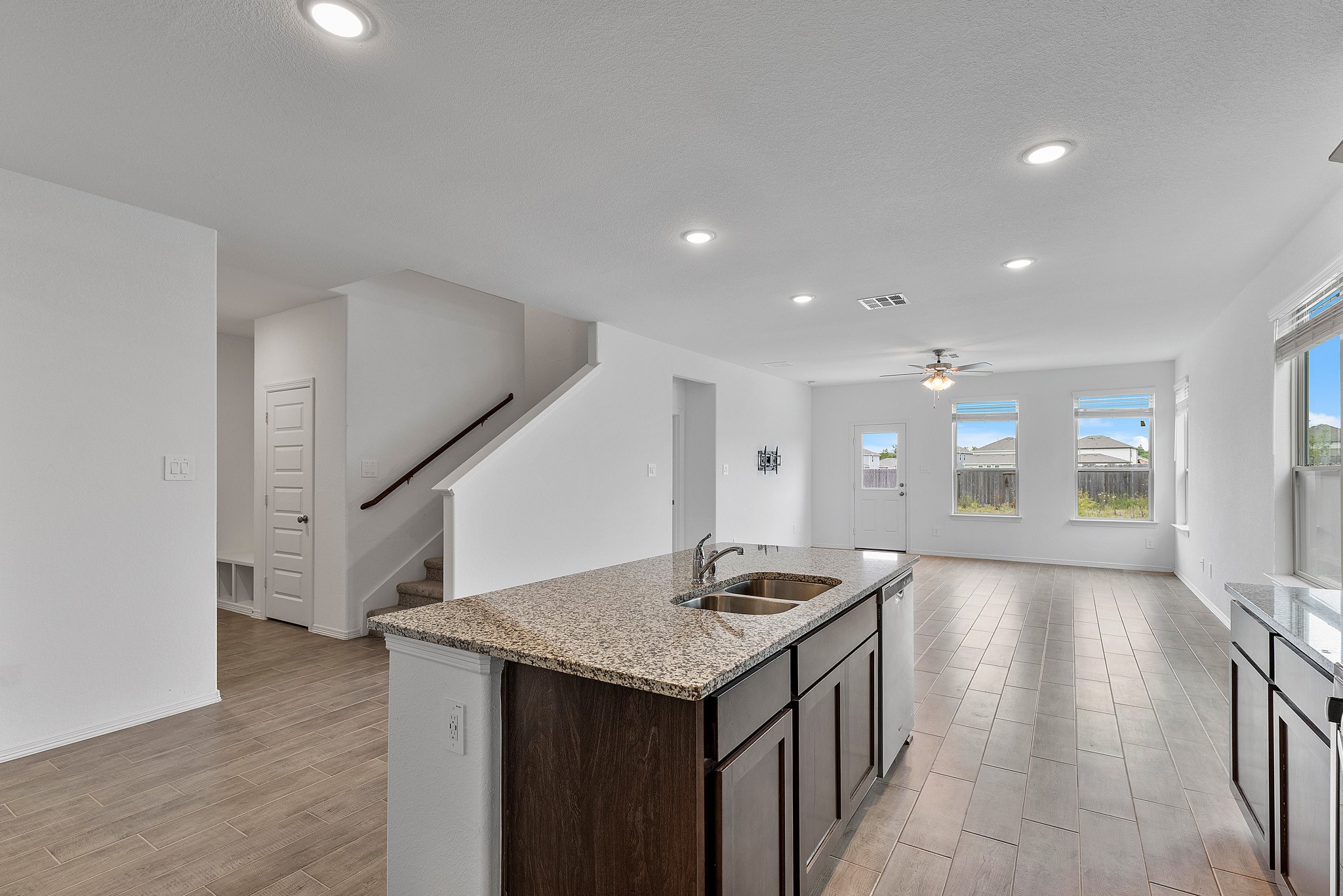 9658 Caney Trails Road Conroe, TX 77303 - Photo 15 of 50 a kitchen that has a lot of cabinets