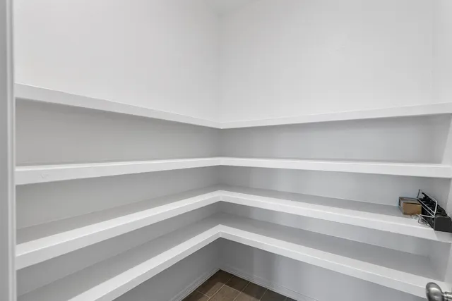 a view of a room with shelves