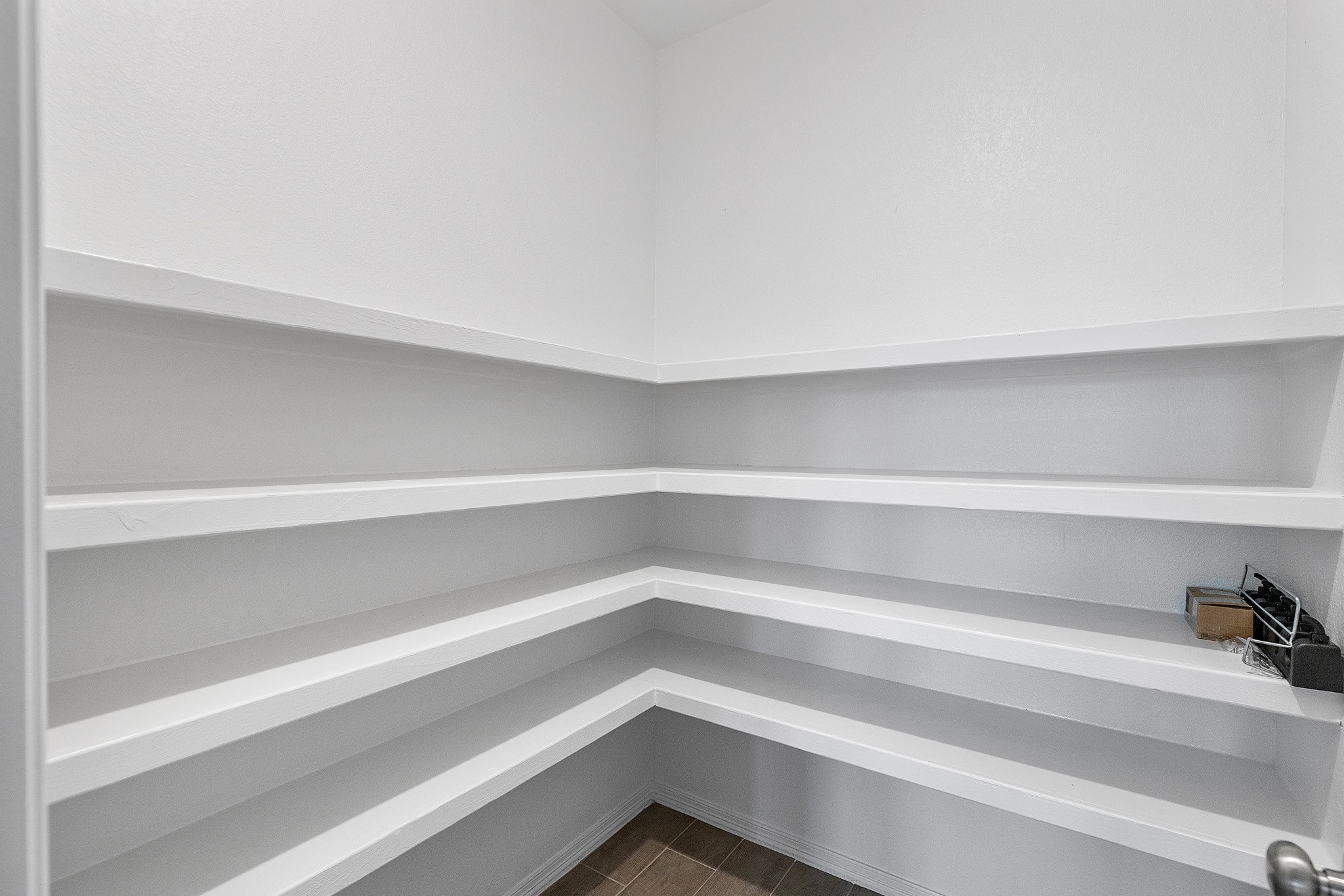 9658 Caney Trails Road Conroe, TX 77303 - Photo 16 of 50 a view of a room with shelves
