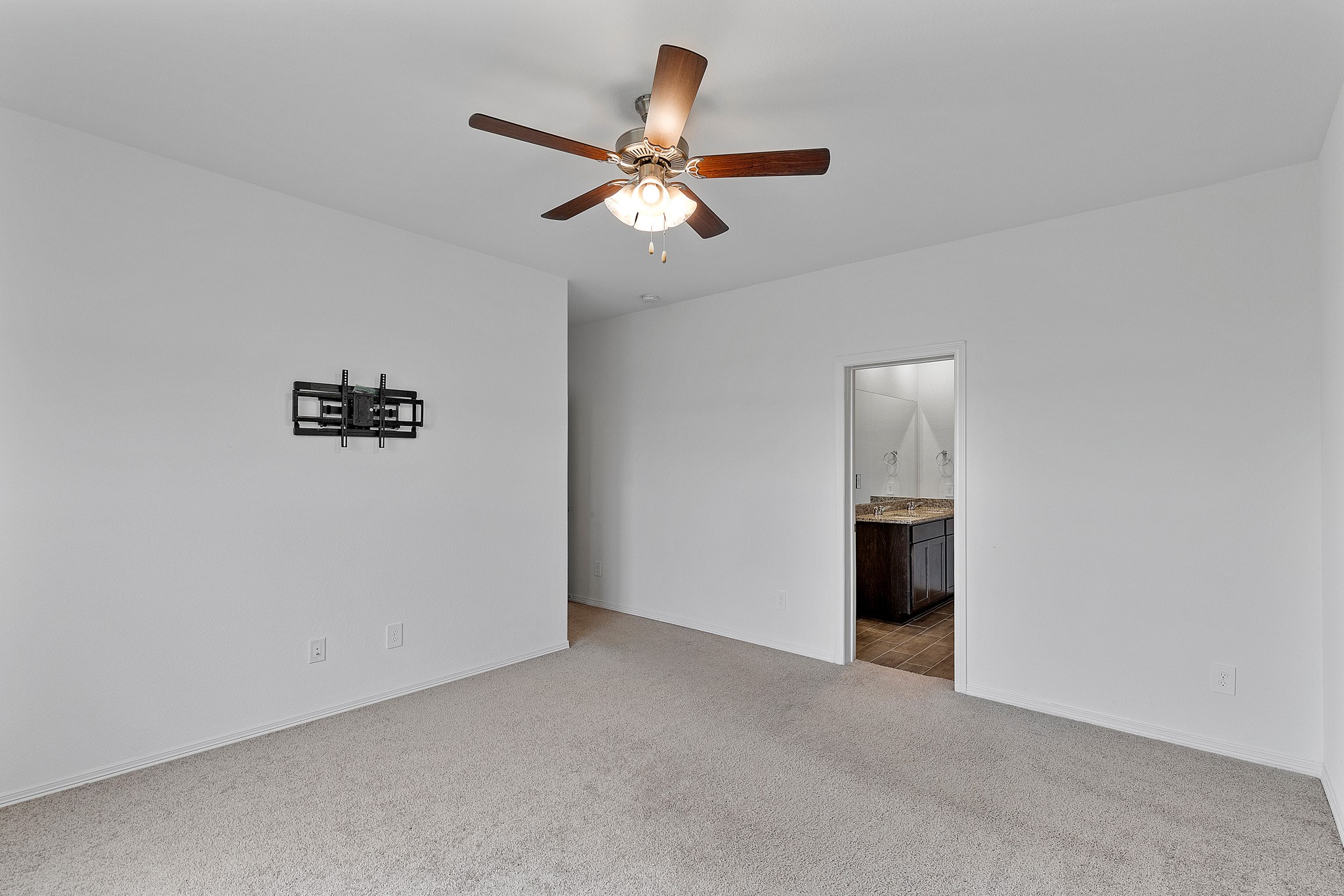 9658 Caney Trails Road Conroe, TX 77303 - Photo 25 of 50 an empty room with closet and windows