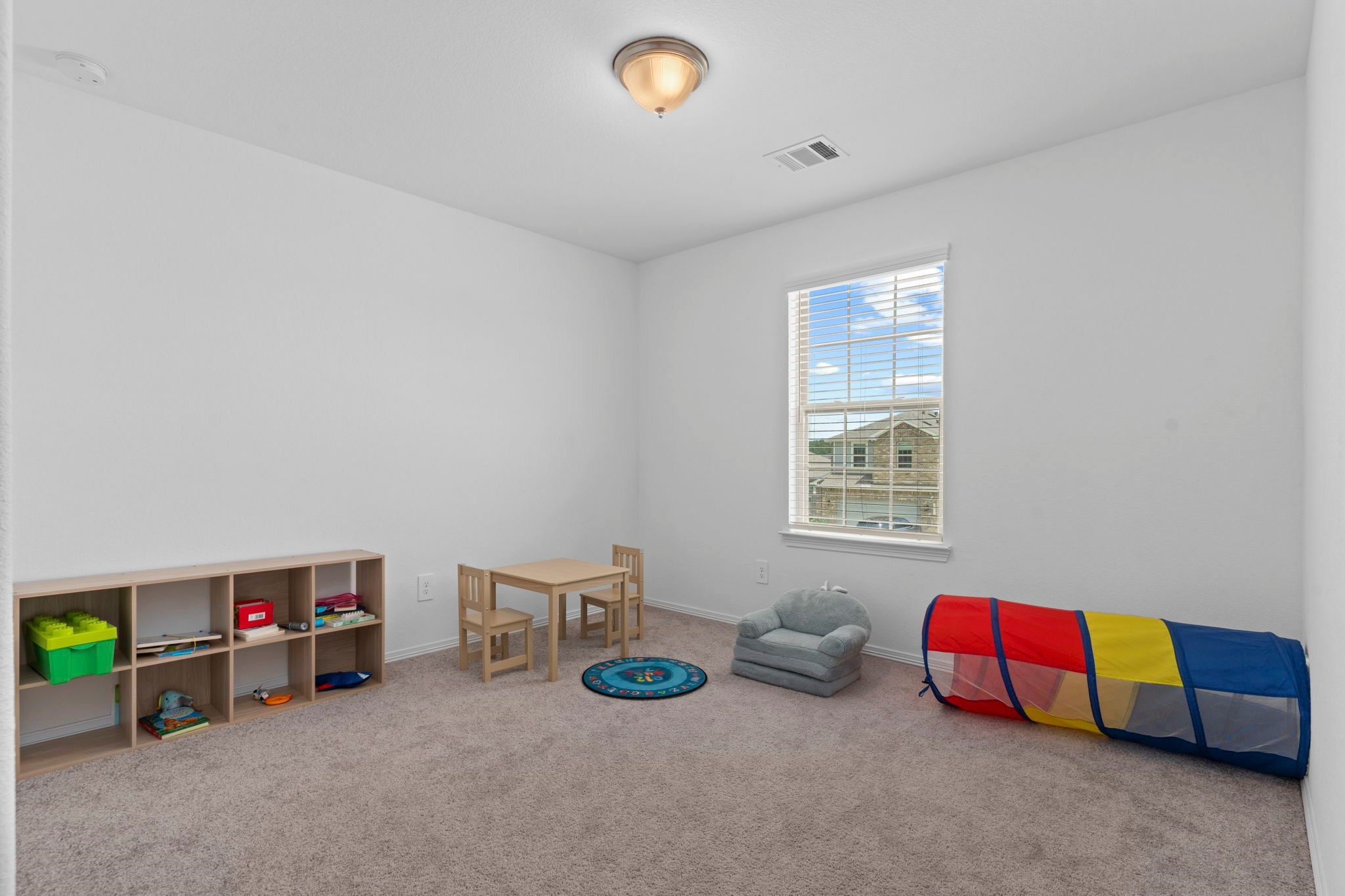 9658 Caney Trails Road Conroe, TX 77303 - Photo 37 of 50 a room with furniture and a window