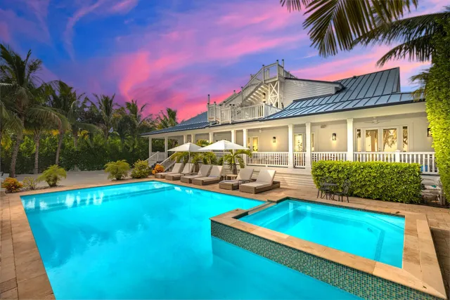 a view of a swimming pool with a patio