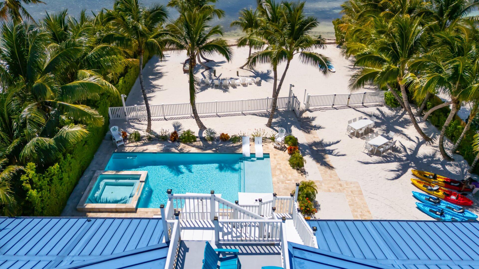 65760 Overseas Highway Long Key, FL 33001 - Photo 5 of 19 a view of a chairs and table on the deck