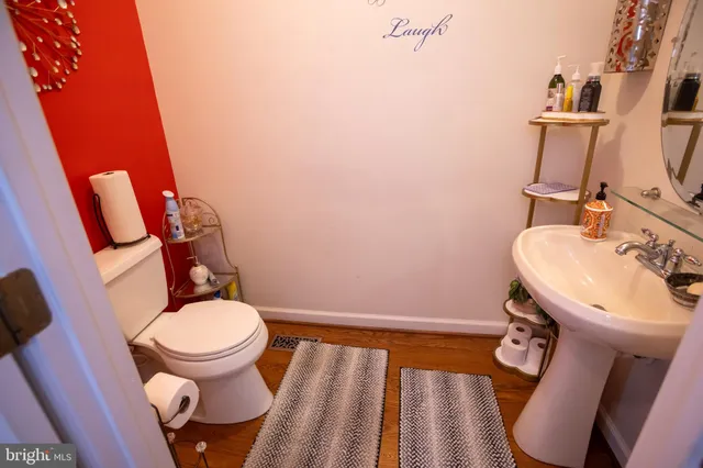 a bathroom with a toilet and a sink