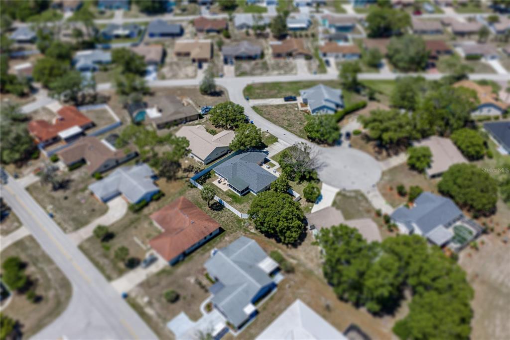7435 Kilbride Court Weeki Wachee, FL 34613 - Photo 50 of 67 an aerial view of residential houses with outdoor space