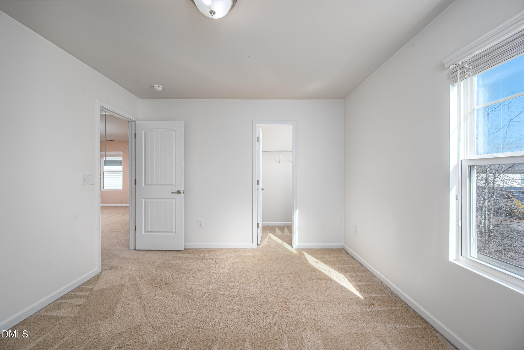 3548 Althorp Drive Raleigh, NC 27616 - Photo 30 of 56 an empty room with windows and closet