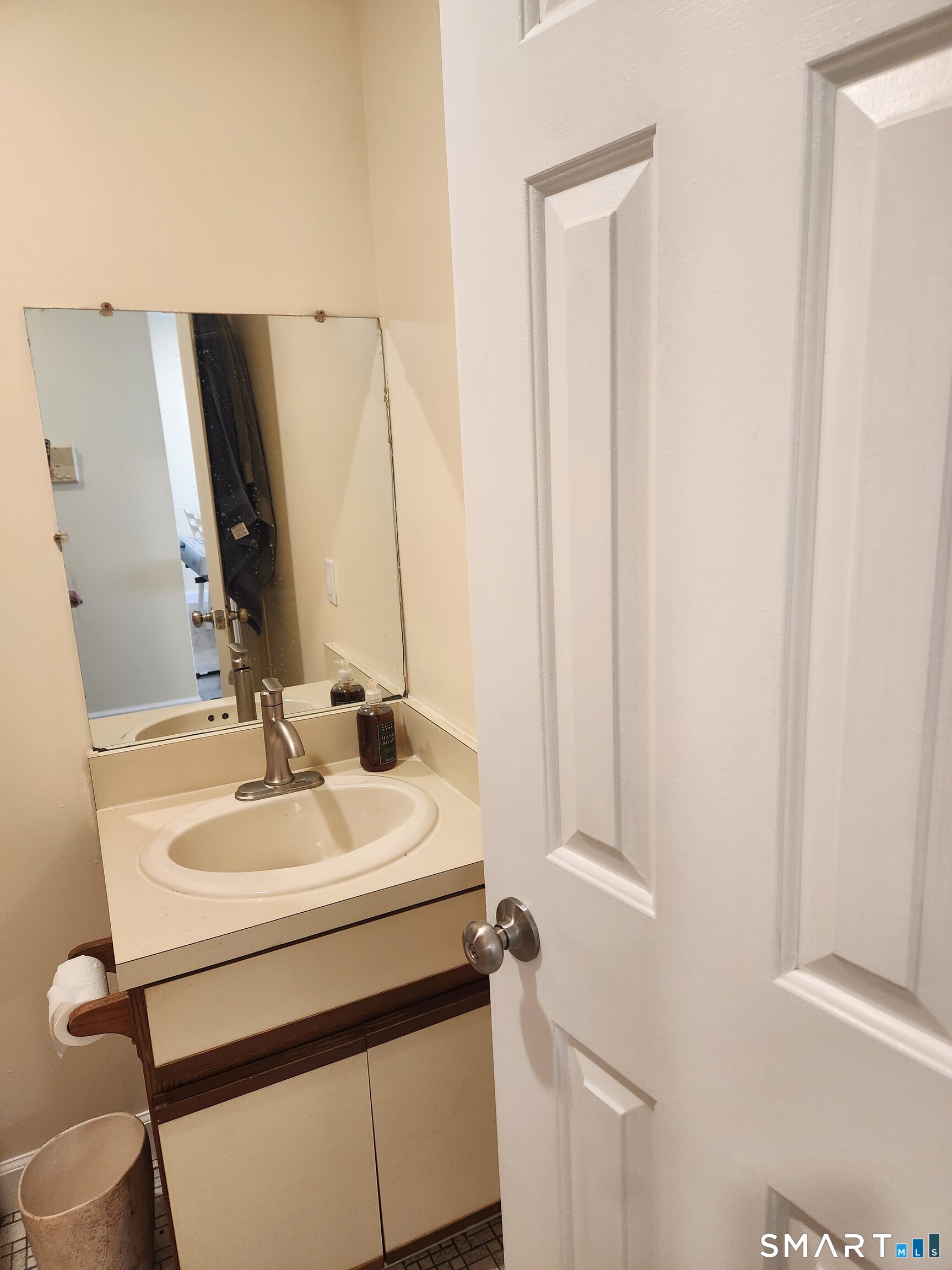 91 4th Street, Unit 7 Ansonia, CT 06401 - Photo 12 of 15 a bathroom with a sink and a mirror