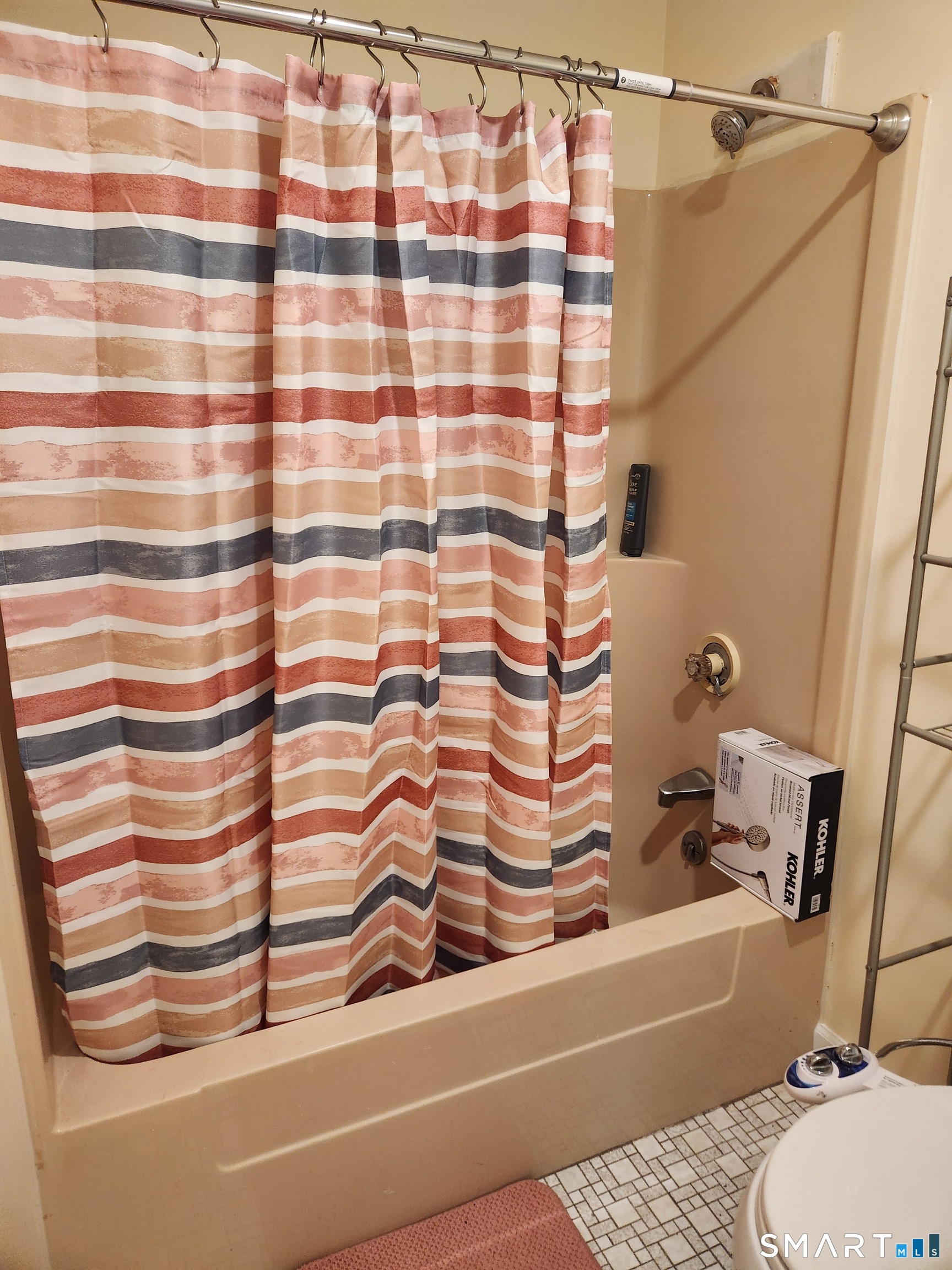 91 4th Street, Unit 7 Ansonia, CT 06401 - Photo 13 of 15 a bathroom with a bathtub and shower