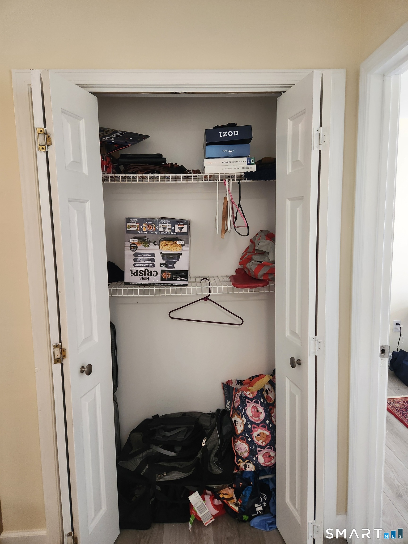 91 4th Street, Unit 7 Ansonia, CT 06401 - Photo 14 of 15 a bedroom with a bed and a window