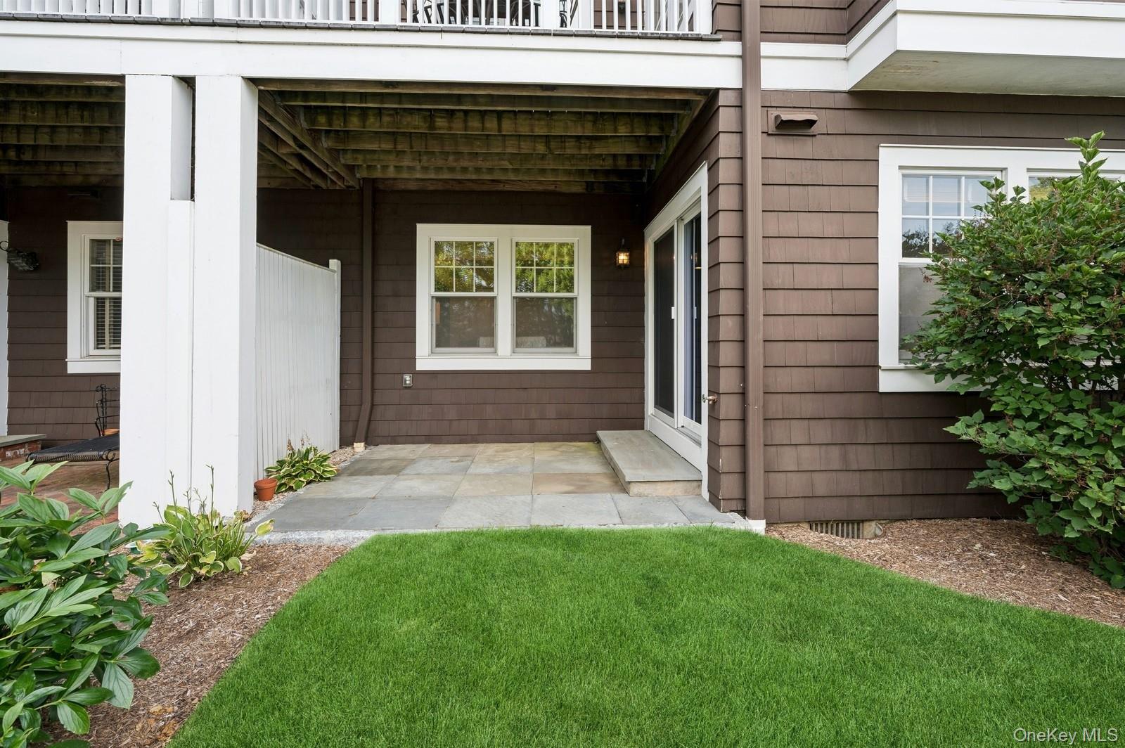 10 Old Jackson Avenue, Unit 72 Hastings-on-Hudson, NY 10706 - Photo 26 of 42 View of exterior entry and patio off the lower level basement