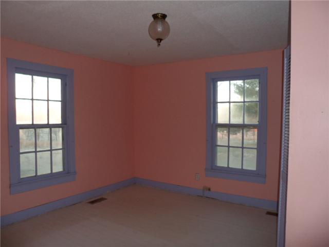 378 Lake Logan Road Ardmore, TN 38449 - Photo 11 of 14 an empty room with a window