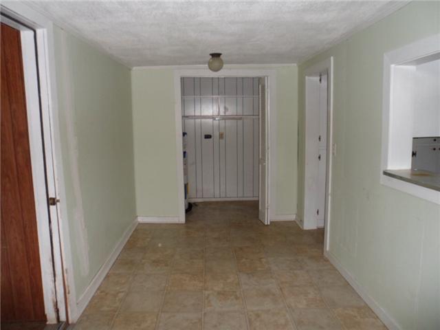 378 Lake Logan Road Ardmore, TN 38449 - Photo 14 of 14 an empty room with windows and bathroom view
