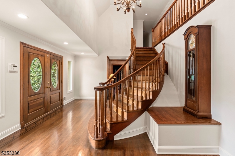 303 Mendham Road Bernardsville, NJ 07924 - Photo 22 of 45 a view of entryway with wooden floor and stairs