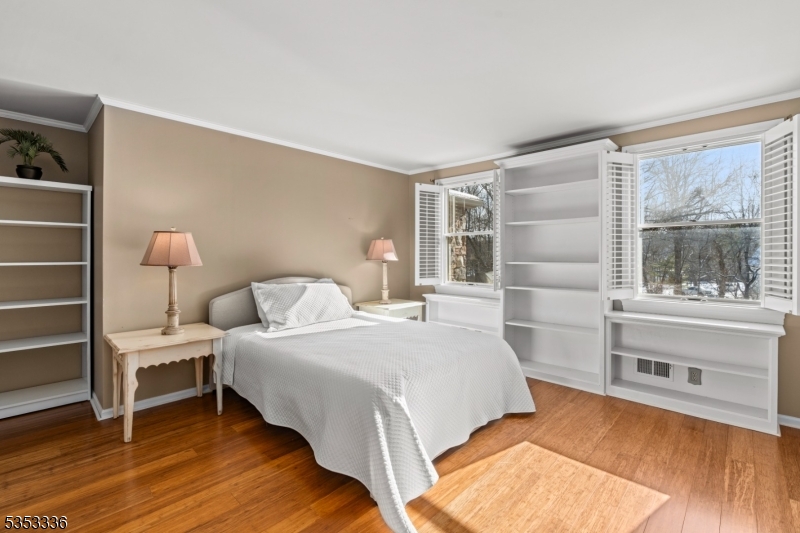 303 Mendham Road Bernardsville, NJ 07924 - Photo 25 of 45 a bedroom with a bed and a large window