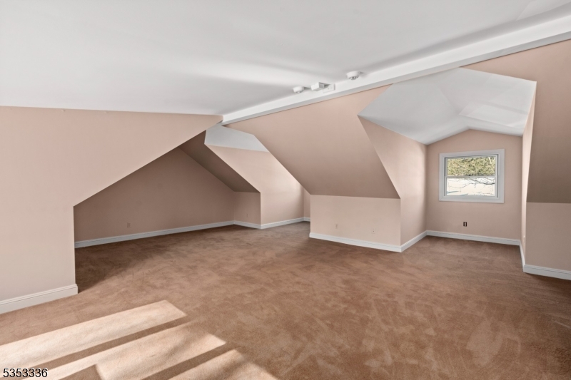 303 Mendham Road Bernardsville, NJ 07924 - Photo 30 of 45 a view of an empty room with a window