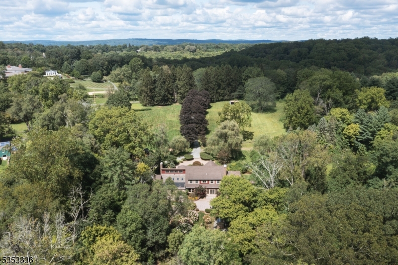 303 Mendham Road Bernardsville, NJ 07924 - Photo 3 of 45 an aerial view of a house with a yard