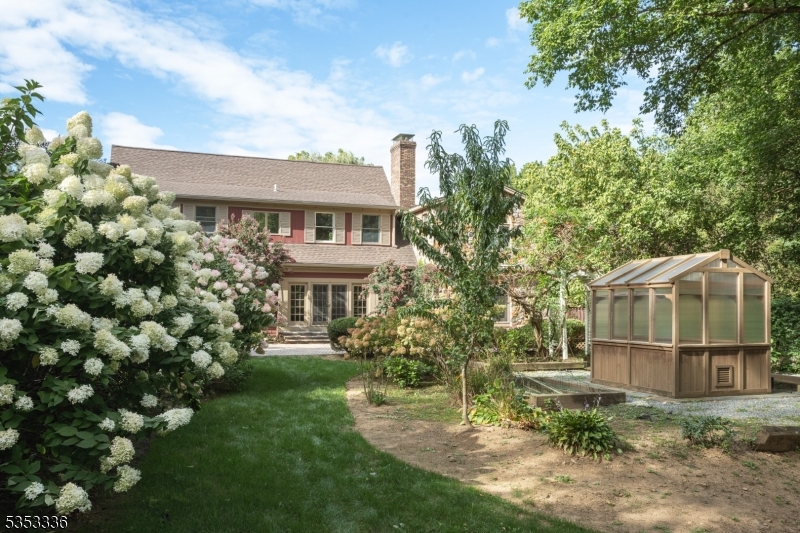 303 Mendham Road Bernardsville, NJ 07924 - Photo 43 of 45 a view of a house with a yard