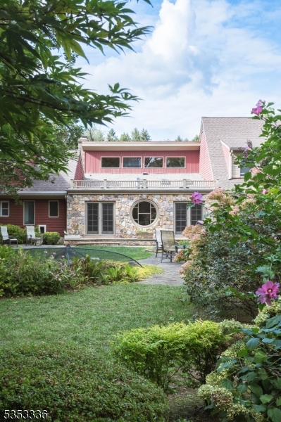 303 Mendham Road Bernardsville, NJ 07924 - Photo 5 of 45 a front view of a house with a yard