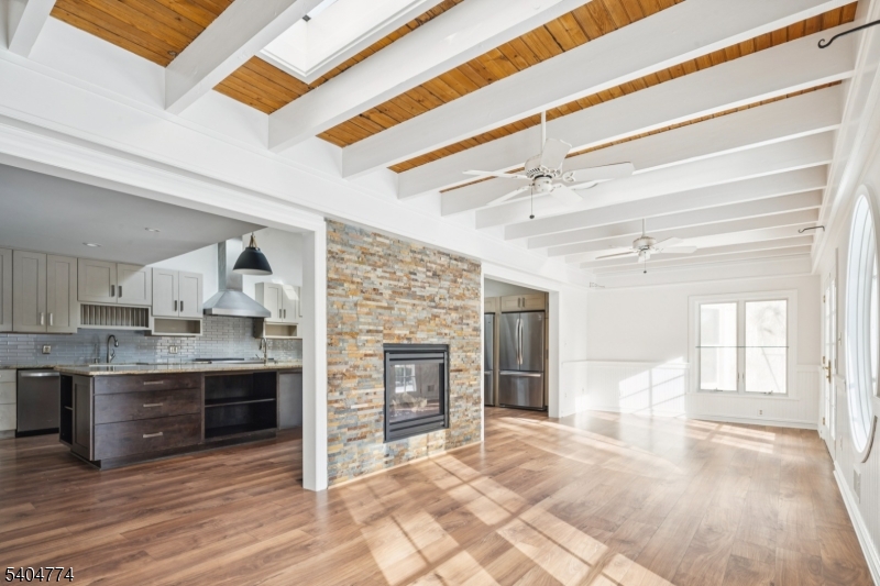 303 Mendham Road Bernardsville, NJ 07924 - Photo 6 of 45 a view of a kitchen with a sink and refrigerator