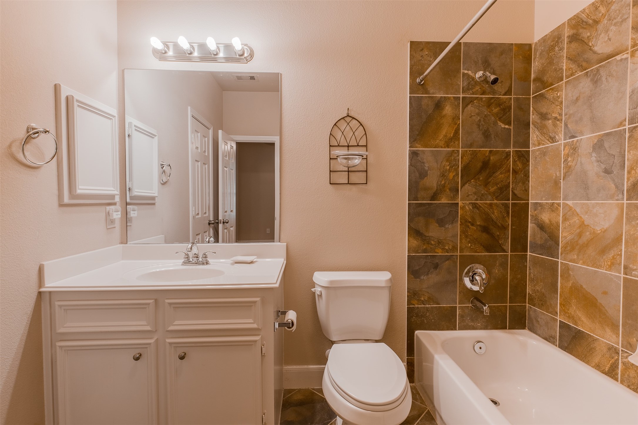 2354 Bastrop Street Houston, TX 77004 - Photo 20 of 21 a bathroom with a sink a toilet and shower