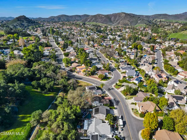 a view of a city with a mountain