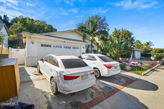 a view of a couches in front of house