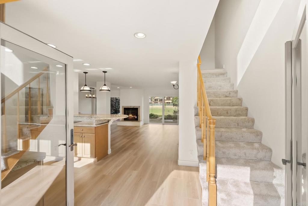 219 Via Osuna Rancho Santa Fe, CA 92091 - Photo 11 of 50 a view of a living room with furniture and wooden floor