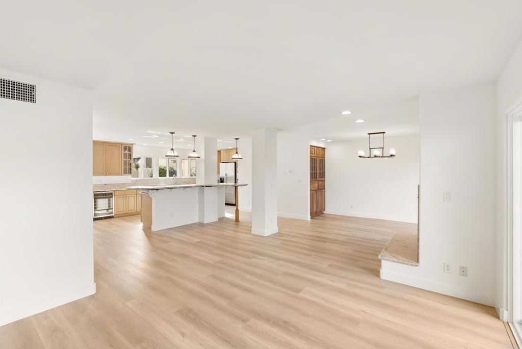 219 Via Osuna Rancho Santa Fe, CA 92091 - Photo 20 of 50 a view of a kitchen with kitchen island and a sink
