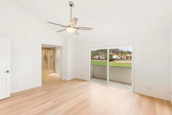 a view of building with outdoor space and river